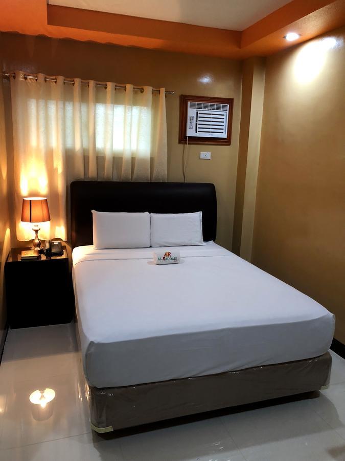 Al-Raddadi Suites Davao Stadt Zimmer foto